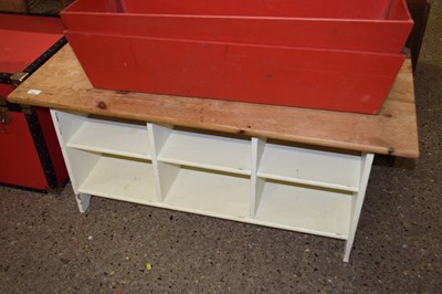 Lot 298 - A pine coffee table with shelved base