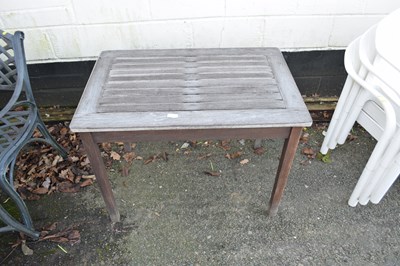 Lot 782 - A slatted hardwood garden table