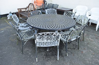 Lot 786 - A circular cast aluminium garden table and...