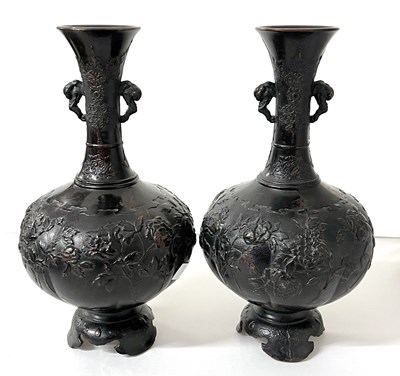 Lot 277 - A pair of Japanese pottery vases decorated in...