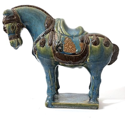 Lot 285 - A Chinese Tang style horse on rectangular base,...