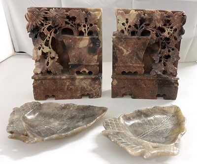 Lot 293 - A pair of rectangular soap stone carvings with...