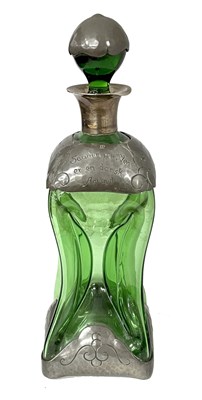 Lot 302 - An Art Nouveau green glass decanter with Dutch...