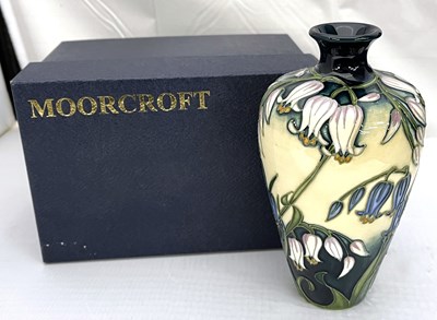 Lot 339 - A modern Moorcroft vase in original box with...