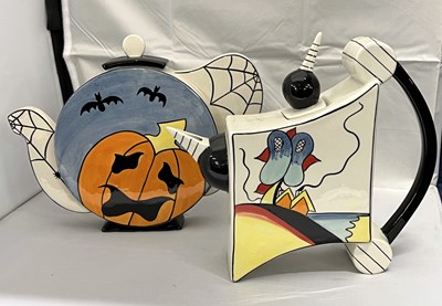 Lot 366 - A Halloween teapot by Lorna Bailey together...