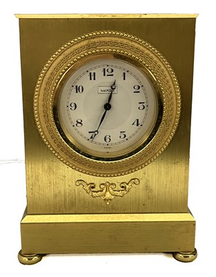 Lot 371 - An early 20th Century brass mantel clock,...