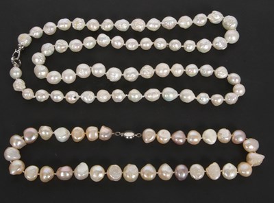 Lot 252 - Two cultured pearl necklaces: one with baroque...