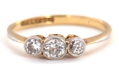 Lot 43 - A three stone diamond ring, set with three...