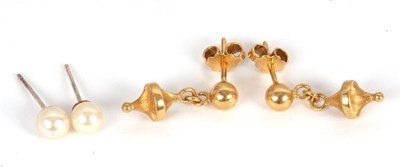 Lot 174 - A pair of 18ct earrings, 20mm long, with posts...