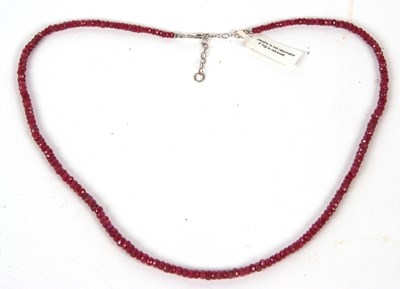 Lot 240 - A ruby bead necklace, the slightly graduated...