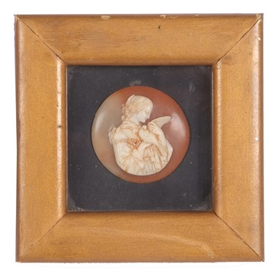 Lot 295 - A framed shell cameo, the round shell cameo of...