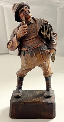 Lot 404 - A Black Forest type wooden carving of a gentleman