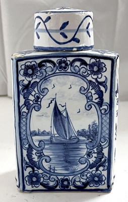 Lot 443 - A Dutch Delft caddy with cover decorated with...