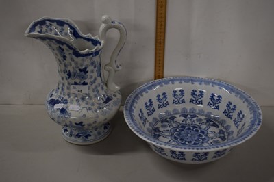 Lot 165 - A blue and white wash bowl and jug