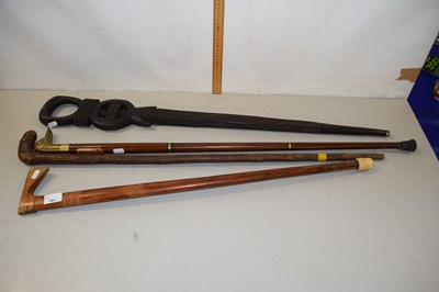 Lot 181 - Group of four assorted walking sticks