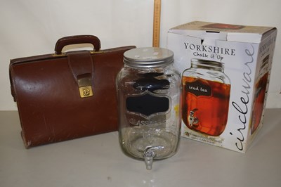 Lot 198 - An ice tea dispenser and a leather case