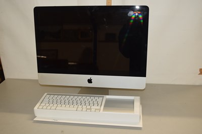 Lot 215 - An Apple computer with keyboard together with...