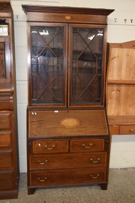 Lot 242 - An Edwardian mahogany bureau bookcase cabinet...