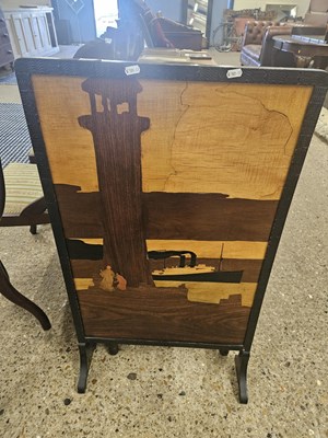 Lot 270 - A marquetry fire screen decorated with a...