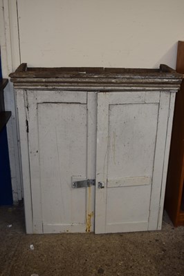 Lot 313 - A painted pine two door cupboard