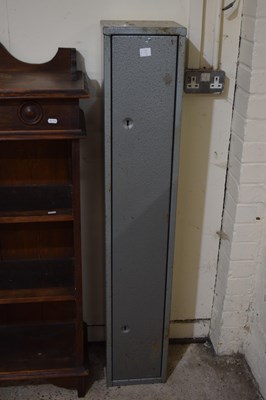 Lot 318 - A metal gun cabinet with four keys