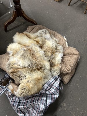 Lot 646 - A large fur rug or bedspread