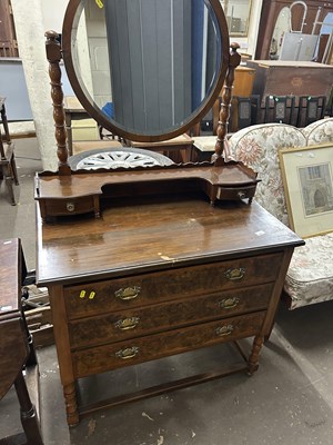 Lot 690 - A walnut veneered dressing chest