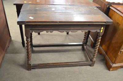 Lot 525 - An 18th Century oak side table with folding...