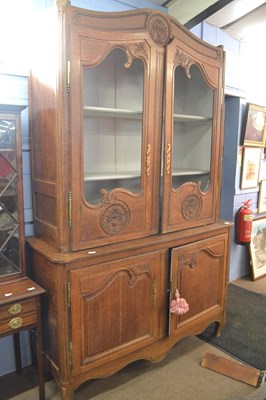 Lot 540 - A 19th Century French oak dresser with arched...