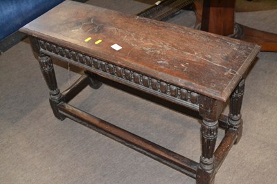 Lot 604 - An antique oak stool of rectangular form, the...