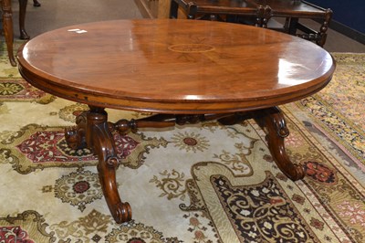 Lot 570 - A Victorian walnut and inlaid coffee table...