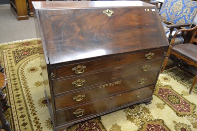 Lot 568 - George III mahogany bureau of typical form...