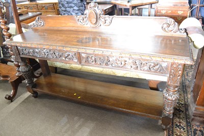 Lot 574 - A Victorian gothic carved oak side or serving...