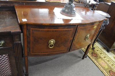 Lot 583 - A mahogany bow front sideboard in the Georgian...