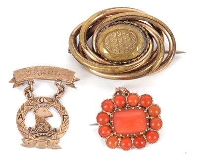 Lot 139 - A 19th century coral keepsake brooch, the...