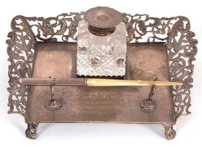 Lot 7 - A late Victorian silver ink stand with pierced...