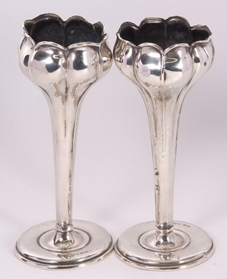 Lot 8 - A pair of Edwardian silver bud vases with...