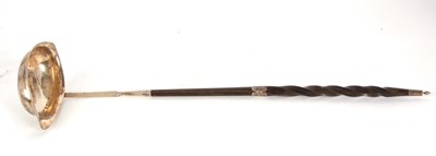 Lot 38 - A Georgian silver toddy ladle, circa 1790...