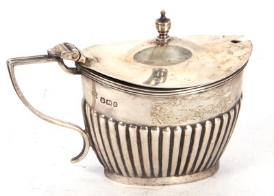 Lot 64 - A late Victorian silver oval shaped mustard...