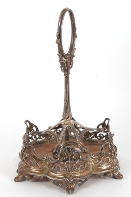 Lot 72 - A large Victorian silver framed cruet stand of...