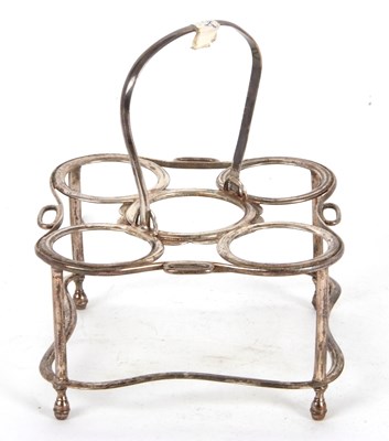 Lot 75 - A George III silver egg cruet frame (only)...