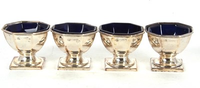 Lot 80 - Set of four George V silver pedestal salts of...