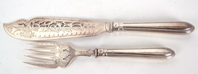 Lot 92 - Pair of Victorian silver fish servers, the...