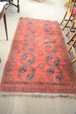 Lot 630 - A 19th Century Afghan wool floor rug with...