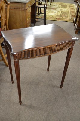 Lot 631 - A small Georgian mahogany serpentine front...