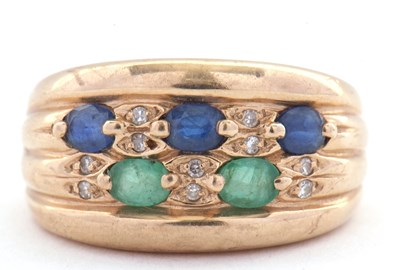 Lot 50 - A 9ct sapphre, emerald and diamond ring, the...