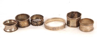 Lot 104 - Mixed Lot:  A group of five serviette rings,...