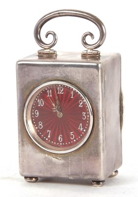 Lot 124 - An Edwardian silver boudoir carriage clock...