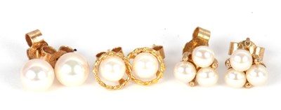 Lot 136 - Three pairs of cultured pearl earrings: a...