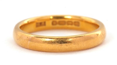 Lot 191 - A 22ct wedding band, hallmarked Birmingham...